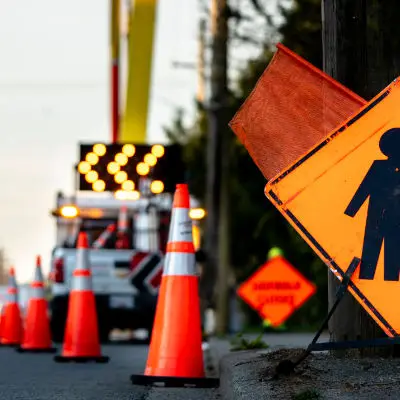 Northern Traffic Control cones and signage set up at an active work zone
